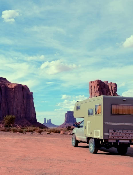 istock Motor Home Driving in Monument Valley. 1277487671