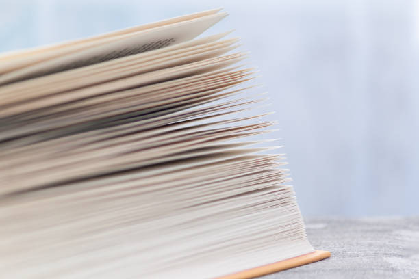 istock Open book with many pages. Education and wisdom concept. 1277492104
