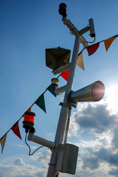 istock ship mast with colorful flags and sun rays 1277494907