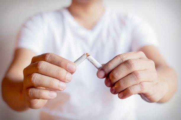 Men quit smoking To maintain their health stock photo