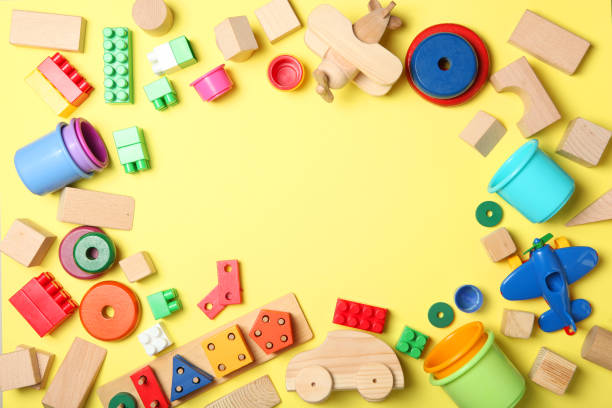 istock Set of different children's toys on a colored background top view. A place to insert text, minimalism. Baby background. 1277496866