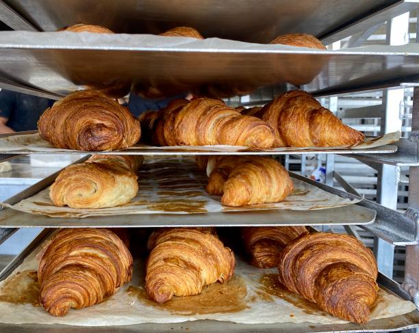 istock Croissants on Trays in a Bakery 1277498830