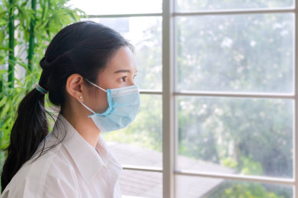istock mental woman and facemask 1277499271