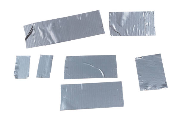 istock Silver scotch tape pieces isolated on white background. 1277501770