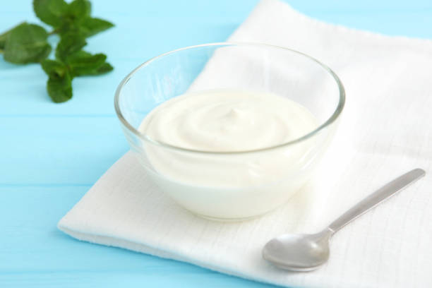 istock Natural white yogurt on the table. Healthy snack, Greek yogurt. 1277503714
