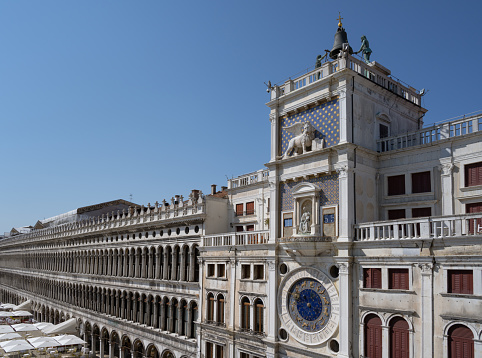 View from San Marco basilica towards San Marco square, with the clock tower on the right.