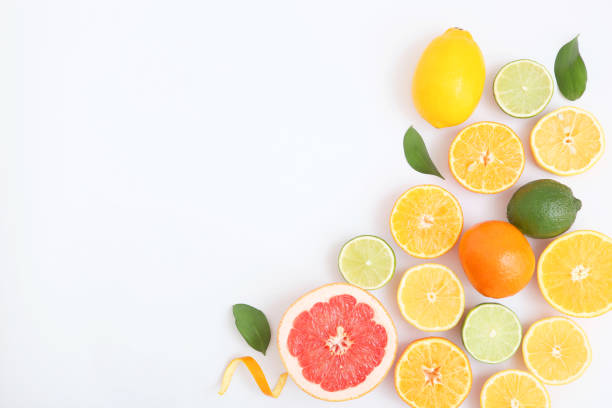 istock Different citrus and juicy slices on a light background top view. Place to insert text. 1277504161
