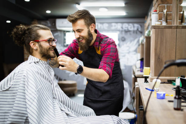 istock Client during beard shaving in barber shop 1277505223