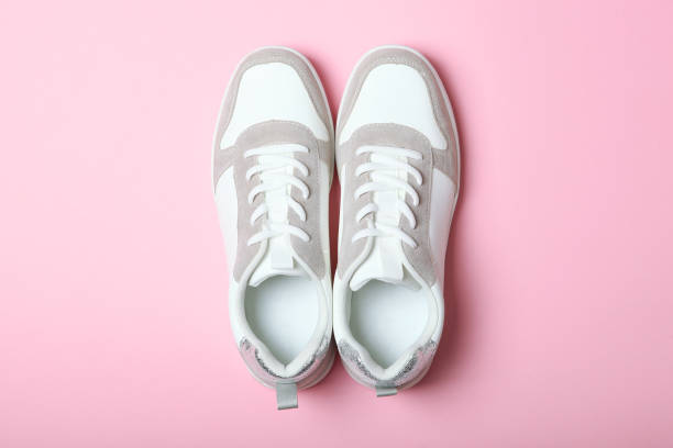 istock women's sneakers on a colored background. Women's shoes. 1277506930