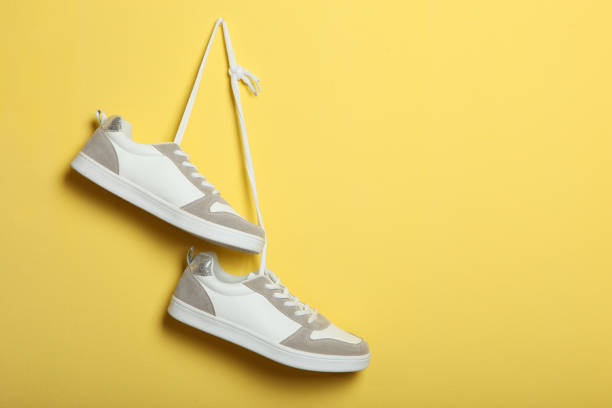 istock women's sneakers on a colored background. Women's shoes. 1277507611