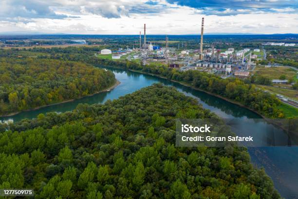 Industry On The Sava River In Sisak Stock Photo - Download Image Now - Refinery, River, Freshwater