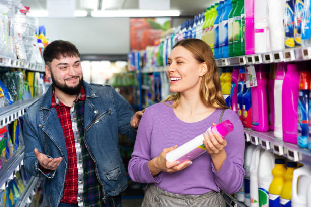 istock Couple shopping detergent products 1277512924
