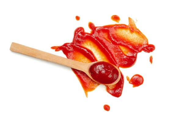 istock Wooden spoon and sauce isolated on white background 1277513954