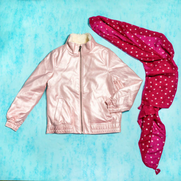 istock Pink woman jacket with a red scarf 1277515034