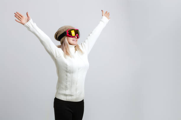 istock woman in ski mask on a white background 1277515269