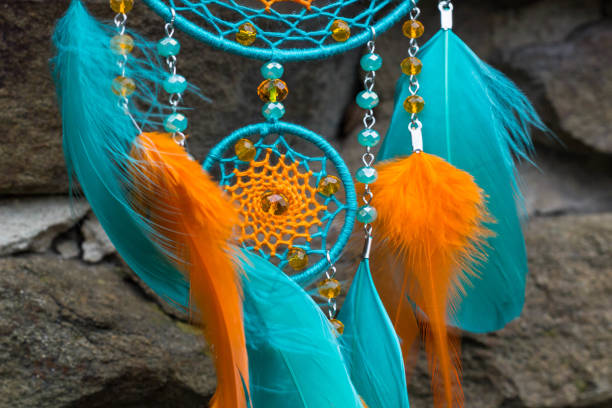 istock Handmade dream catcher with feathers threads and beads rope hanging 1277515336