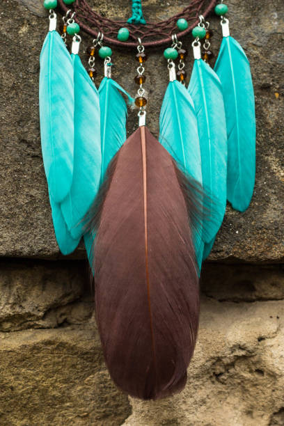 istock Handmade dream catcher with feathers threads and beads rope hanging 1277515342