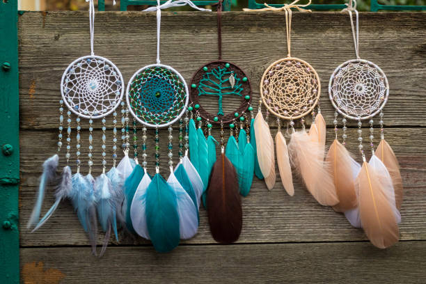 istock Handmade dream catcher with feathers threads and beads rope hanging 1277515347