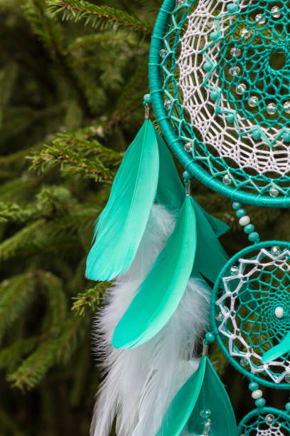 Handmade dream catcher with feathers threads and beads rope hanging