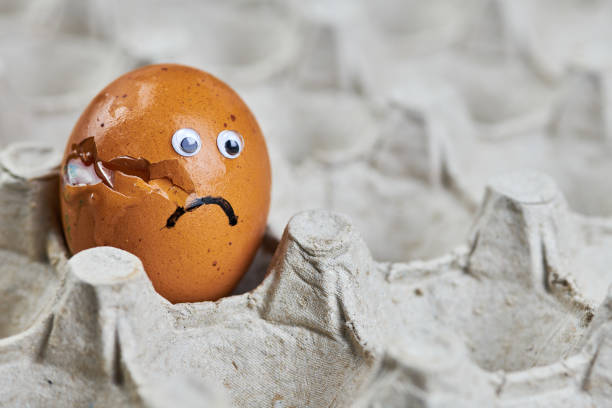 istock Sad cracked egg in paper egg tray 1277517789