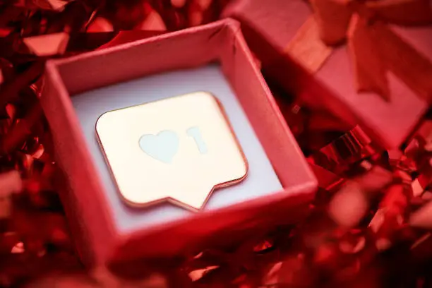 Photo of Like symbol in red gift box