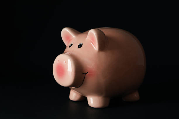 istock Piggy bank on black background, close up 1277518430