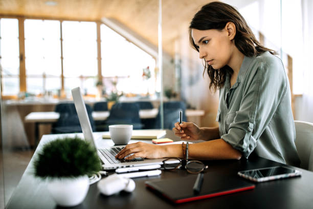 istock Young busy woman working from home 1277520164