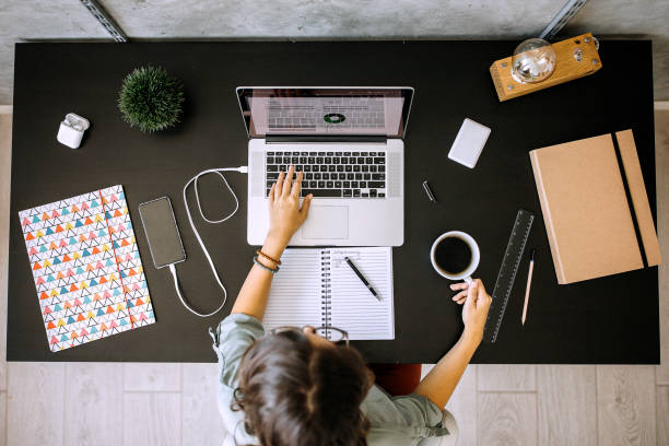 istock Multitasking young female entrepreneur at home office 1277520213