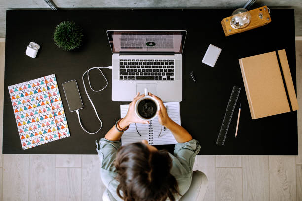 istock Multitasking young female entrepreneur at home office 1277520240