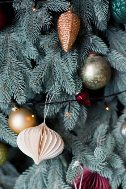 istock Christmas tree with pink gold decorations 1277520243