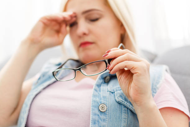istock yawning woman sitting on sofa at home 1277521679