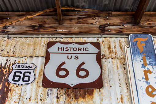 Hackberry, Arizona, USA - February 17, 2020: Rusty historic Arizona Route 66 sign at the Hackberry General Store in the American Southwest.