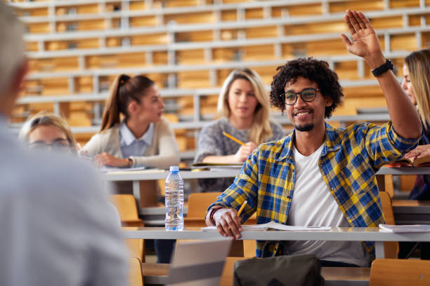 istock Male student raising the hand for a question at the lecture 1277523464