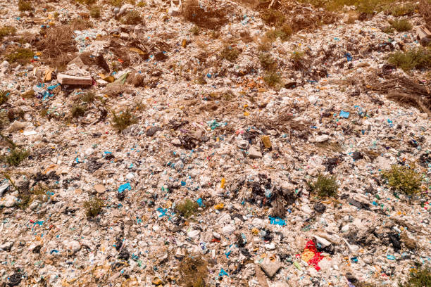 istock Aerial view of garbage dump landfill from drone pov 1277524293