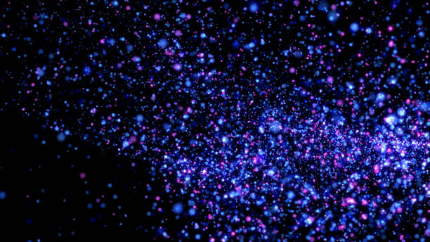 istock Purple stardust particles on black background 1277524398