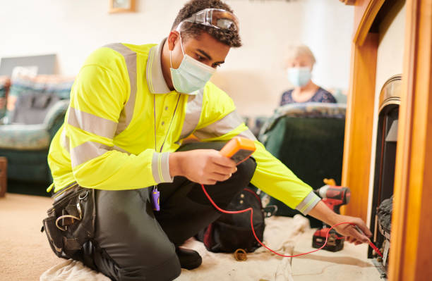 covid safe heating engineer covid safe care worker checking senior’s fire heating engineer stock pictures, royalty-free photos & images