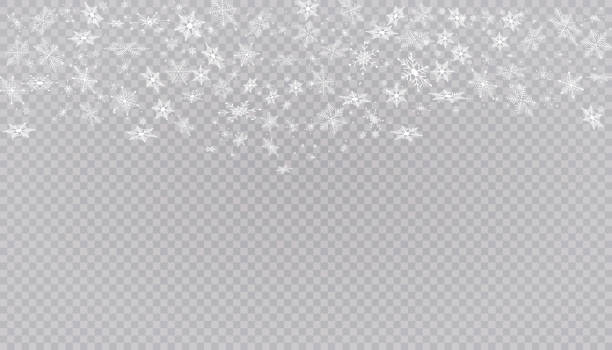 istock White snow flies on a transparent background. Christmas snowflakes. Winter blizzard background illustration. 1277530970