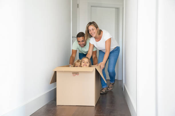 istock Happy Caucasian parents playing with children 1277532303