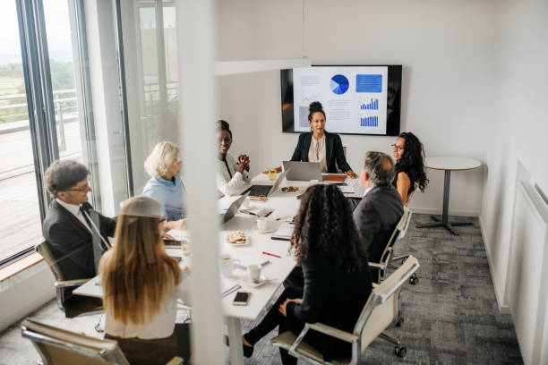 istock Personal Perspective into Modern Board Room Meeting 1277532650