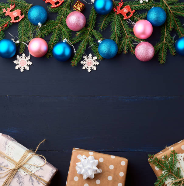 istock green spruce branches, Christmas blue and pink balls 1277533501