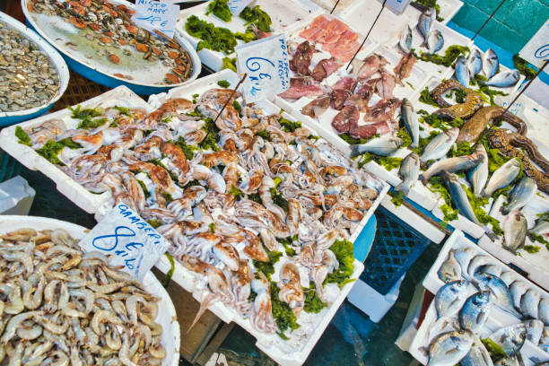 The Fishmarket in the old Town of Catania in Sicily in south Italy in Europe.