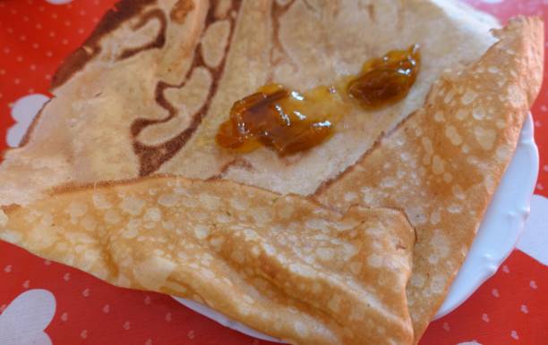 istock Sweet pancakes served with mirabelle plum jam 1277541543