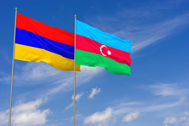 istock Azerbaijan and Armenia flags over blue sky background. 3D illustration 1277545540