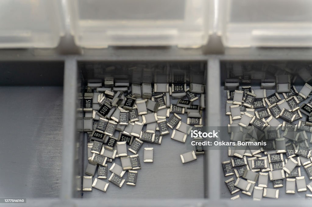 Microscopic Component Container Grey Scattered Microscopic Smt Surface Mount Chip Resistors Sorted In ...