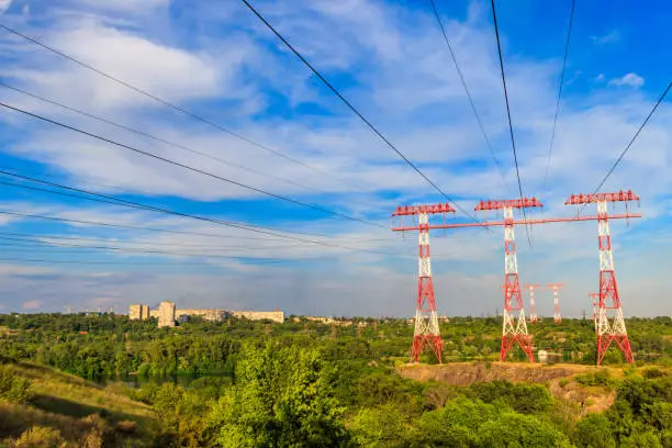 High voltage power line across the Dnieper river on Khortytsia island in Zaporizhia, Ukraine