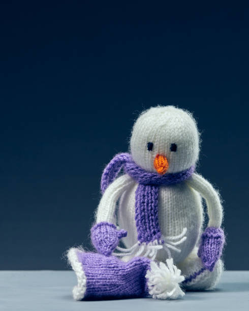 istock Snowman made of wool on a blue background. 1277548956