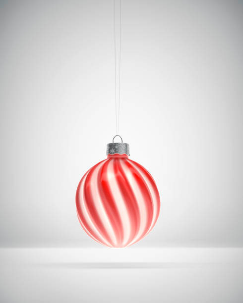 istock Glossy red and white twisted striped Christmas bauble 1277549089