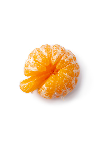 Peeled mandarin orange, yellow flesh, fresh, juicy, sweet, on a white background.