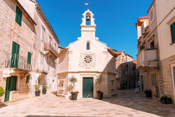 St. John's square in Jelsa town, Hvar island, Croatia St. John's square in Jelsa town, Hvar island, Croatia. jelsa stock pictures, royalty-free photos & images