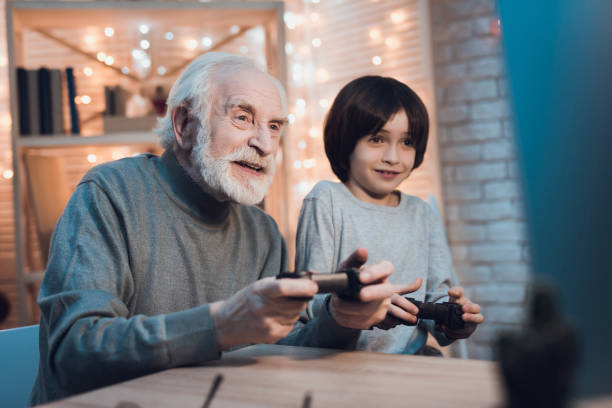 Free Stock Photo of Father and grandfather are teaching a little boy to ...